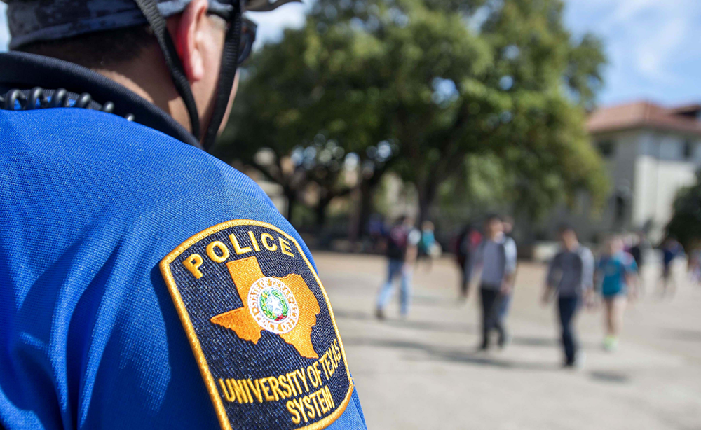 EDU-University-Texas-Police-Officer-Campus-Sm-TY EDU-University-Texas-Police-Officer-Campus-Sm-TY