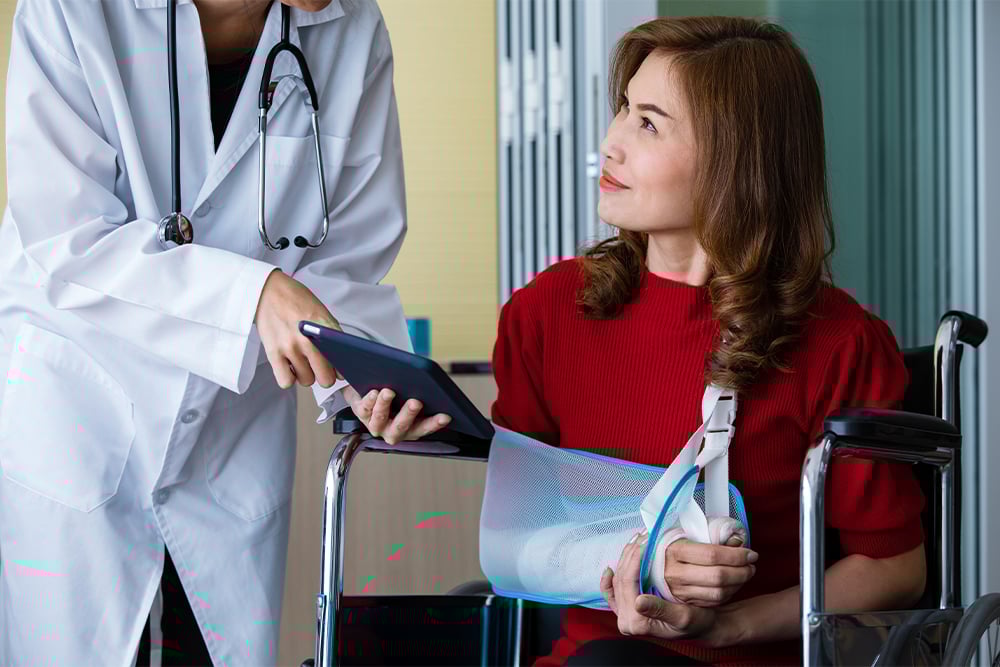 female-injured-consulting-with-doctor