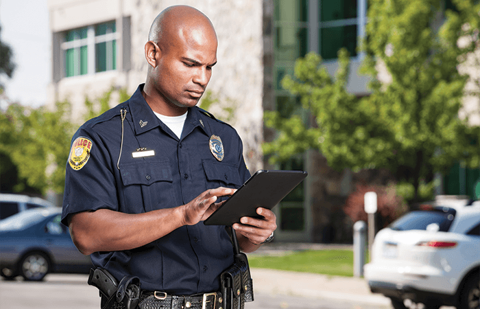 700-officer with tablet