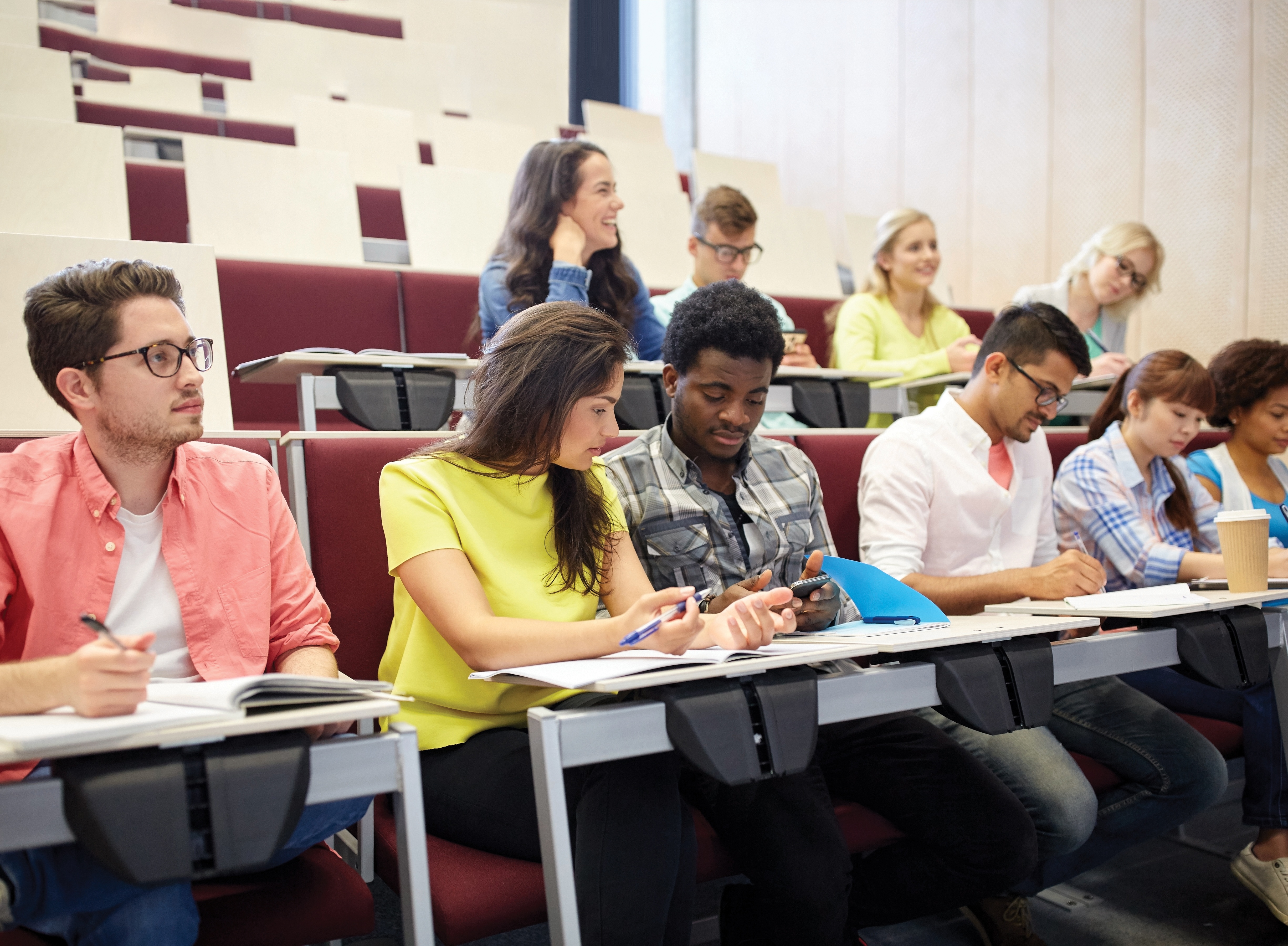 College students with smartphone at lecture